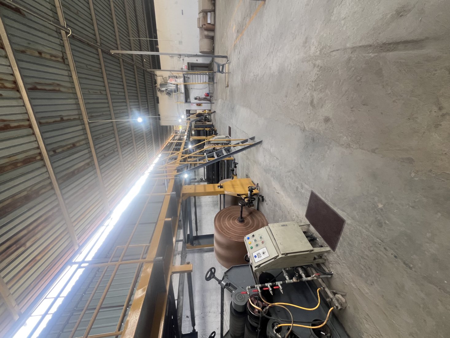 Corrugation line with a kraft paper reel loaded at the Propack Converters plant