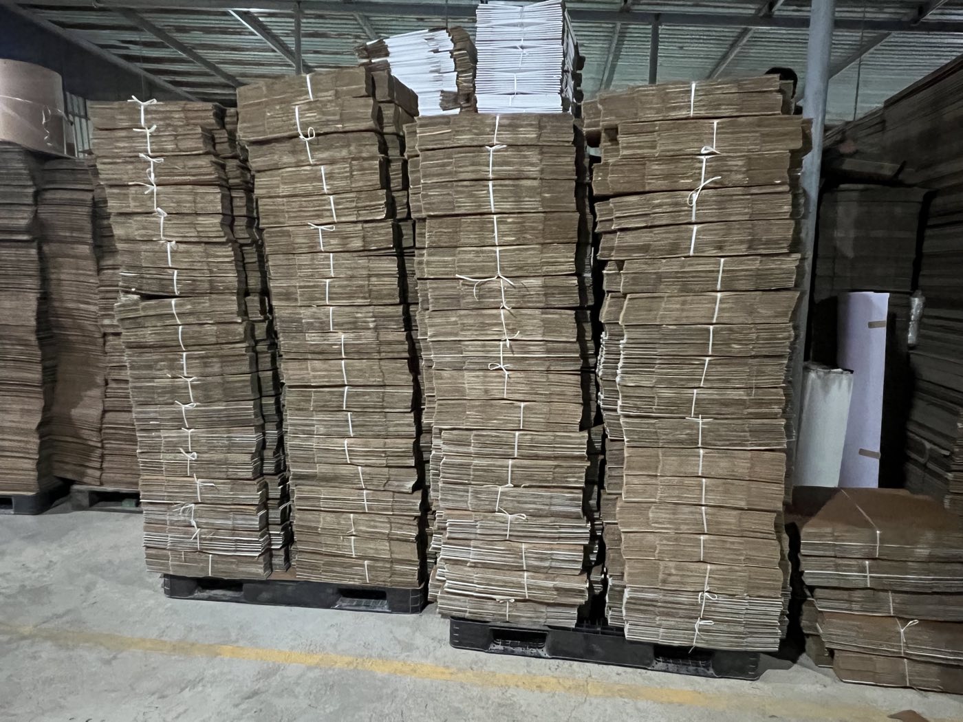Bundled finished cartons stacked ready for dispatch